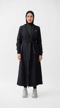 VELÉA Céleste Cloak — oversized hooded modest activewear layer in matte black